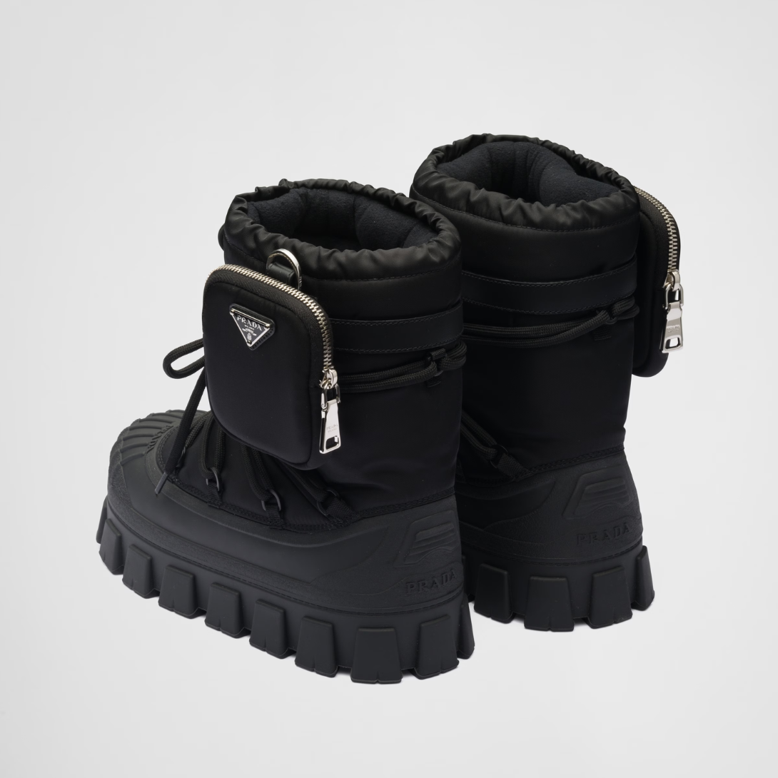Re-Nylon gabardine après-ski boots with pouch – made of leather and nylon, an industrial fabric traditionally tied to the brand, – LUX VERSE Luxury Designer Fashion Outlet