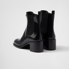 Brushed leather booties Black – upper with elasticized side gusset and pull tab Leather lining Enameled metal – LUX VERSE Luxury Designer Fashion Outlet