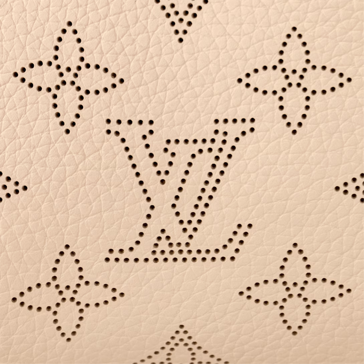 Hand It All PM – the Mahina Hand It All PM bag is made with the Maison’s exclusive perforated calfskin – LUX VERSE Luxury Designer Fashion Outlet