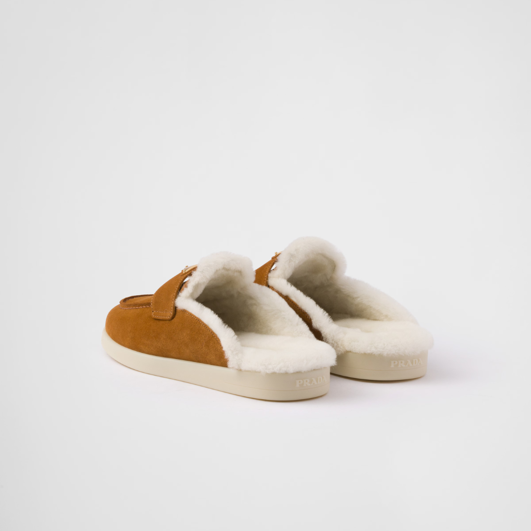 Suede and shearling mules – these suede mules with a sleek, modern silhouette are completed by a soft shearling – LUX VERSE Luxury Designer Fashion Outlet