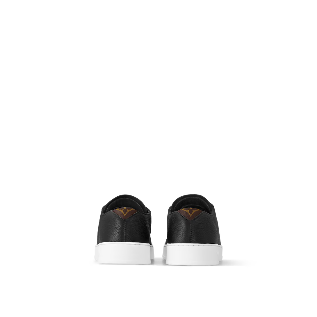 Resort Sneaker – its understated design is complemented by discreet signatures, including – LUX VERSE Luxury Designer Fashion Outlet