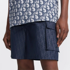 Oblique Swim Shorts – crafted in navy blue technical fabric, they are enhanced by a side flap pocket – LUX VERSE Luxury Designer Fashion Outlet
