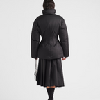 Re-Nylon down iconic jacket – padded with goose down, the garment is decorated with the iconic enameled metal – LUX VERSE Luxury Designer Fashion Outlet