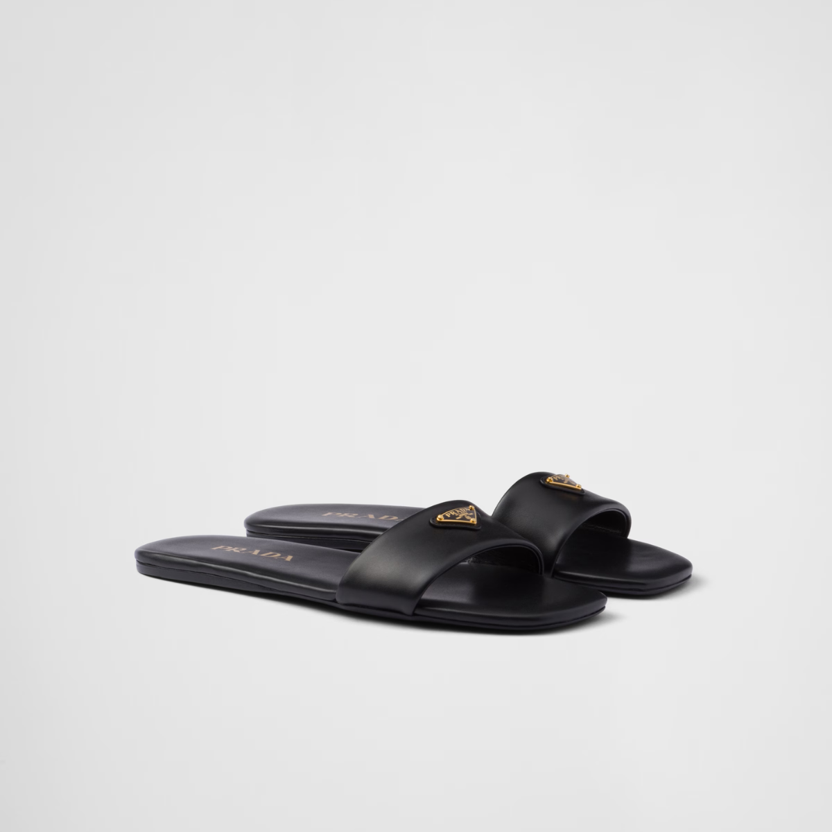 Leather slides – the flat, sleek leather silhouette with a square toe is completed by the iconic – LUX VERSE Luxury Designer Fashion Outlet