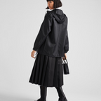 Re-Nylon hooded blouson jacket – the enameled metal triangle logo adds an iconic note – LUX VERSE Luxury Designer Fashion Outlet