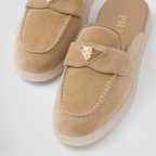 Suede mules – the enameled metal triangle logo embellishes the band, while the rubber sole adds – LUX VERSE Luxury Designer Fashion Outlet