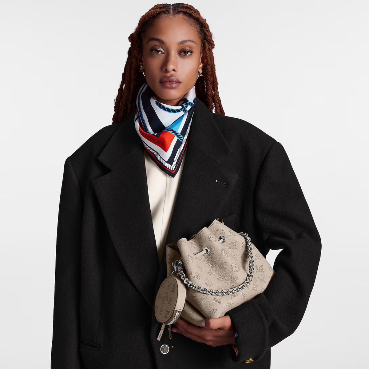 Bella Bucket Bag – the bag’s small size and the attached round coin purse, featuring a miniature – LUX VERSE Luxury Designer Fashion Outlet