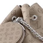 Bella Bucket Bag – the bag’s small size and the attached round coin purse, featuring a miniature – LUX VERSE Luxury Designer Fashion Outlet