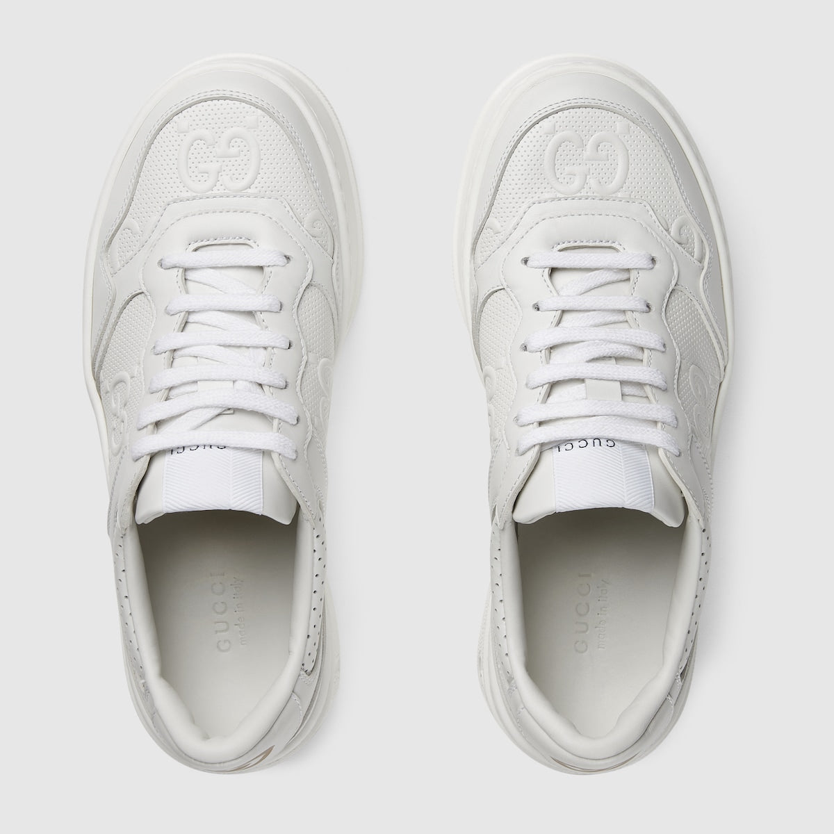 Women's GG embossed sneaker – crafted from GG embossed leather, the monogram motif adds a logo twist – LUX VERSE Luxury Designer Fashion Outlet