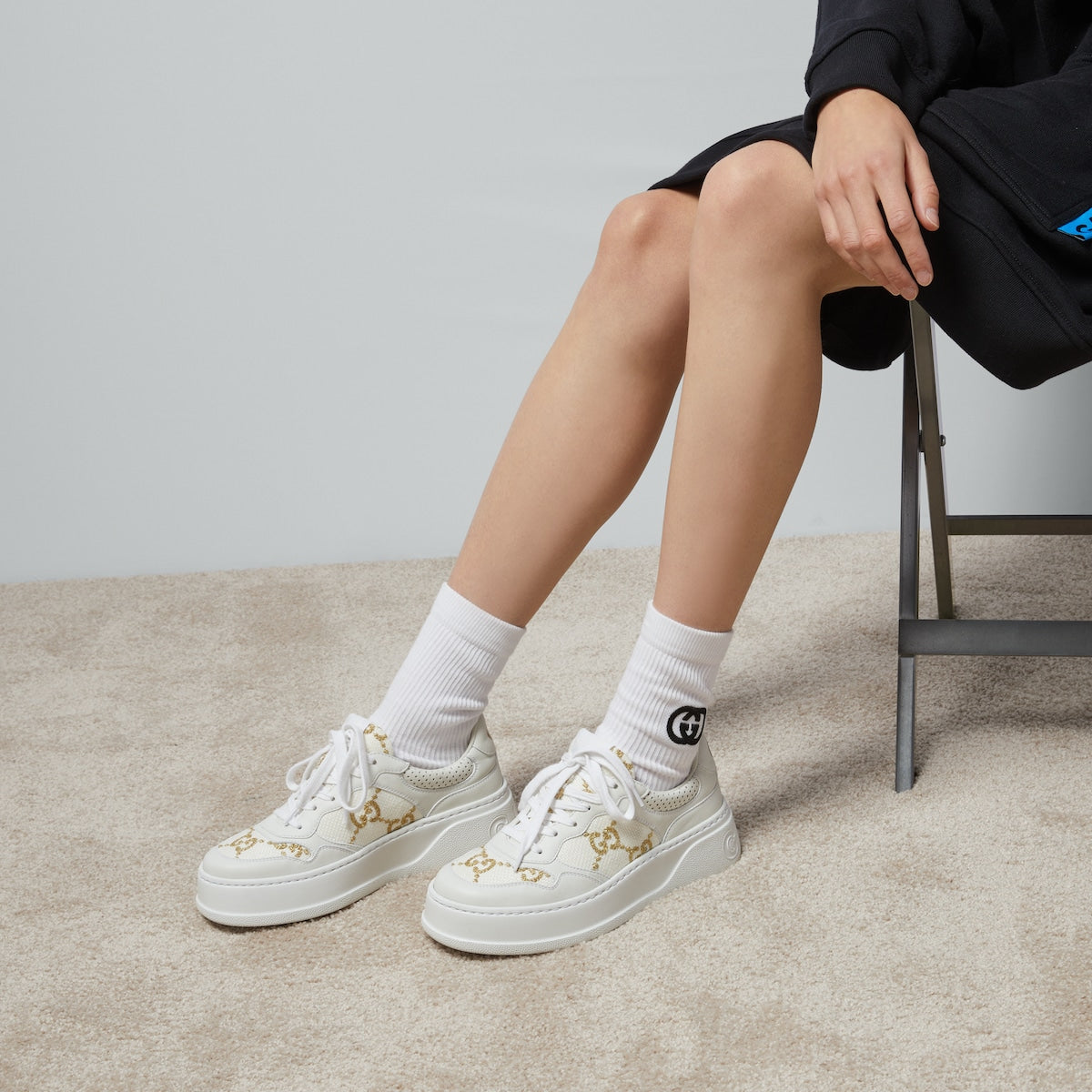 Women's GG rhombi sneaker – here, the pattern defines this pair of sneakers in gold lamé – LUX VERSE Luxury Designer Fashion Outlet