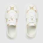 Women's GG rhombi sneaker – here, the pattern defines this pair of sneakers in gold lamé – LUX VERSE Luxury Designer Fashion Outlet