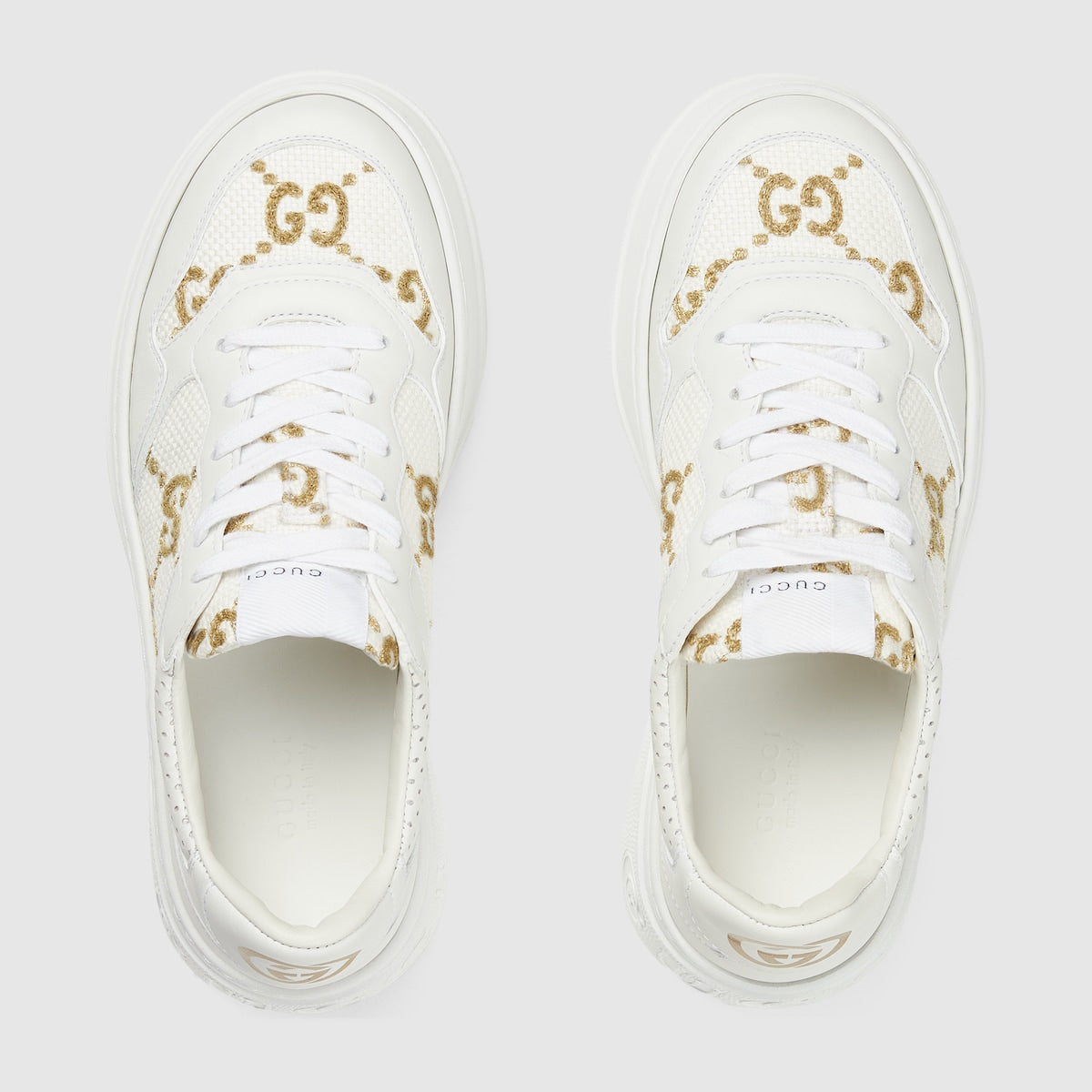 Women's GG rhombi sneaker – here, the pattern defines this pair of sneakers in gold lamé – LUX VERSE Luxury Designer Fashion Outlet