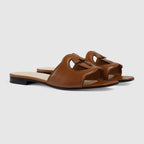 Slide leather sandal with Interlocking G – an ode to timeless elegance, the Love Parade collection explores archival symbols – LUX VERSE Luxury Designer Fashion Outlet