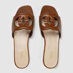 Slide leather sandal with Interlocking G – an ode to timeless elegance, the Love Parade collection explores archival symbols – LUX VERSE Luxury Designer Fashion Outlet