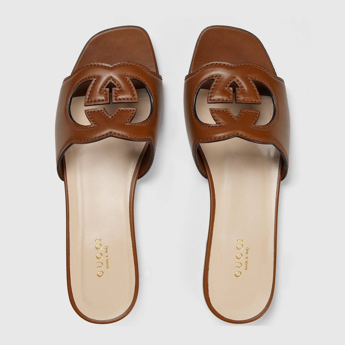 Slide leather sandal with Interlocking G – an ode to timeless elegance, the Love Parade collection explores archival symbols – LUX VERSE Luxury Designer Fashion Outlet
