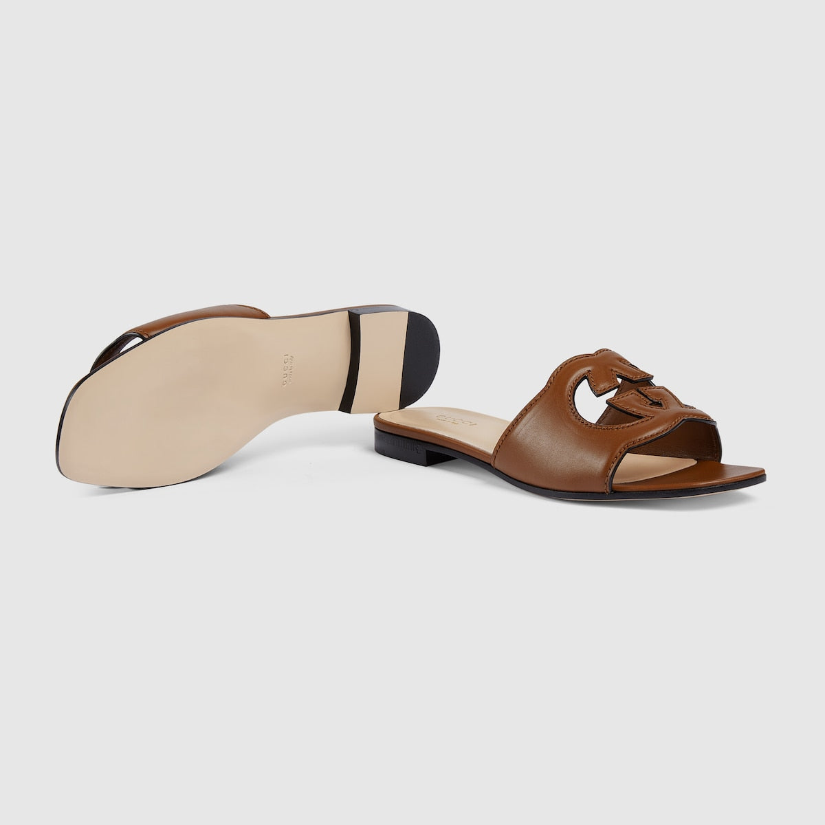 Slide leather sandal with Interlocking G – inspired by the summer spirit and beach clubs on the Italian coast, this item is – LUX VERSE Luxury Designer Fashion Outlet