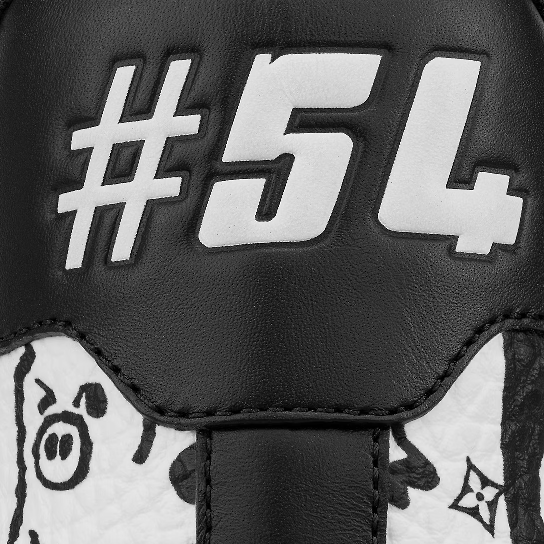 Comic Canvas Trainer Sneakers – it is signed with the Initials, Monogram Flowers and the #54 logo, referring to – LUX VERSE Luxury Designer Fashion Outlet