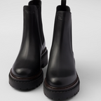 Leather Chelsea boots – a hybrid silhouette blending classic details and contemporary touches defines these – LUX VERSE Luxury Designer Fashion Outlet