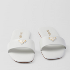 Leather slides – the flat, sleek leather silhouette with a square toe is completed by the iconic – LUX VERSE Luxury Designer Fashion Outlet