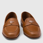 Nappa leather loafers – upper with leather band Enameled metal triangle logo Monoblock leather sole – LUX VERSE Luxury Designer Fashion Outlet
