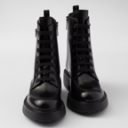 Brushed leather boots – leather lining Enameled metal triangle logo Polyester laces Boot leg: 16 cm Rubber – LUX VERSE Luxury Designer Fashion Outlet
