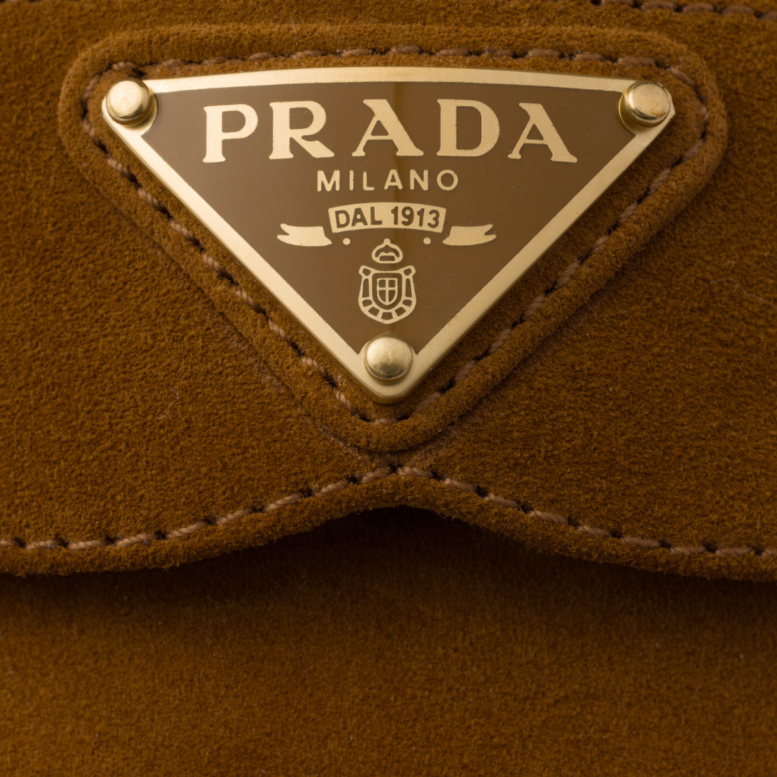 Suede and shearling mules – upper with leather band Enameled metal triangle logo Rubber sole, 25 mm – LUX VERSE Luxury Designer Fashion Outlet