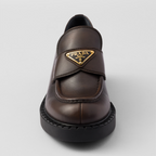 Chocolate leather loafers – upper with leather band Enameled metal triangle logo Monoblock rubber sole, 50 mm, – LUX VERSE Luxury Designer Fashion Outlet