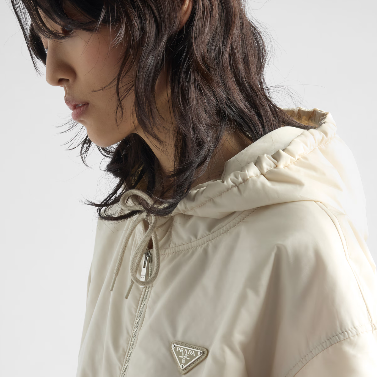 Lightweight hooded Re-Nylon blouson jacket – a sporty character and minimalist lines define the silhouette of this hooded blouson – LUX VERSE Luxury Designer Fashion Outlet