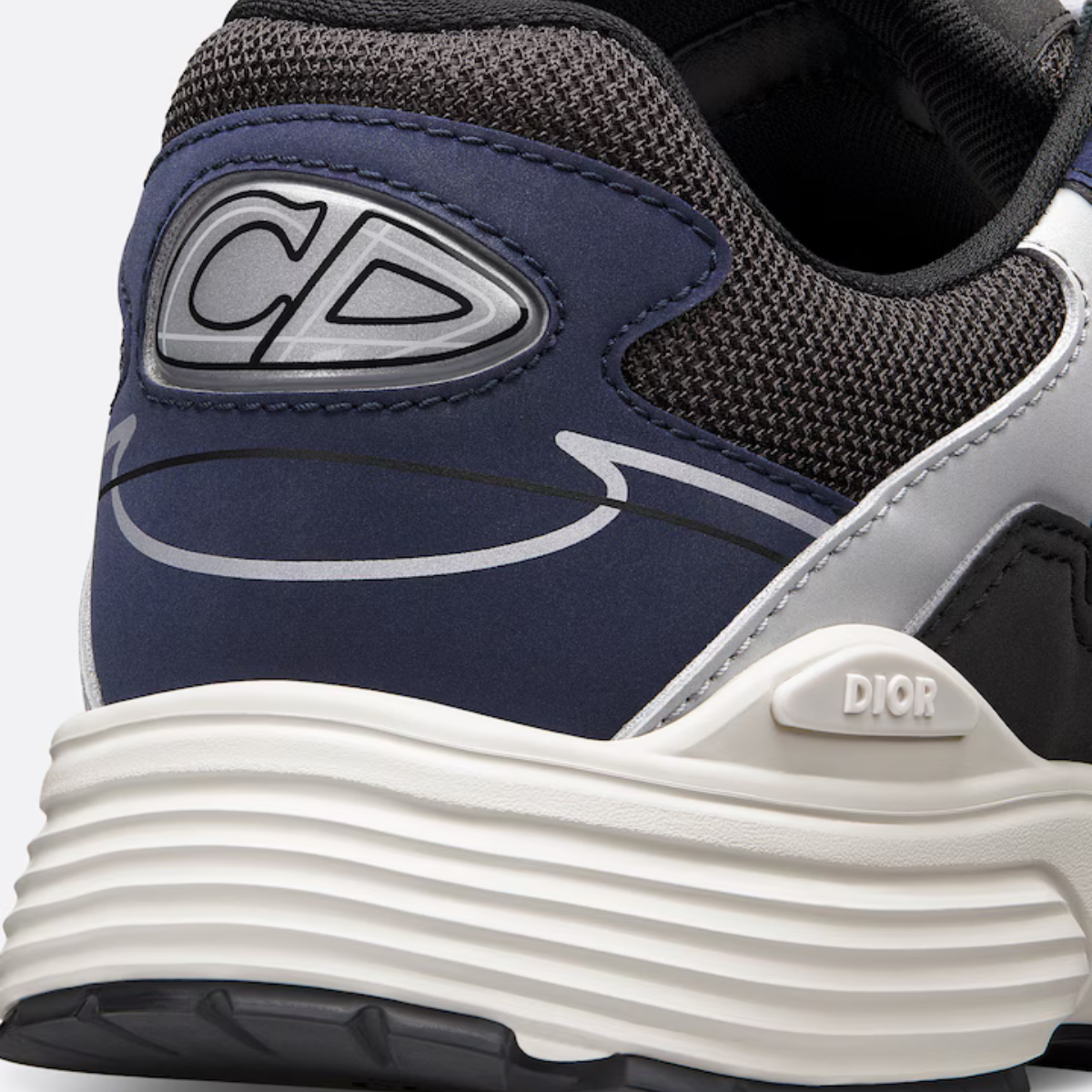 B30 Sneaker – crafted in blue mesh and gray, white and black technical fabric, it is enhanced by – LUX VERSE Luxury Designer Fashion Outlet