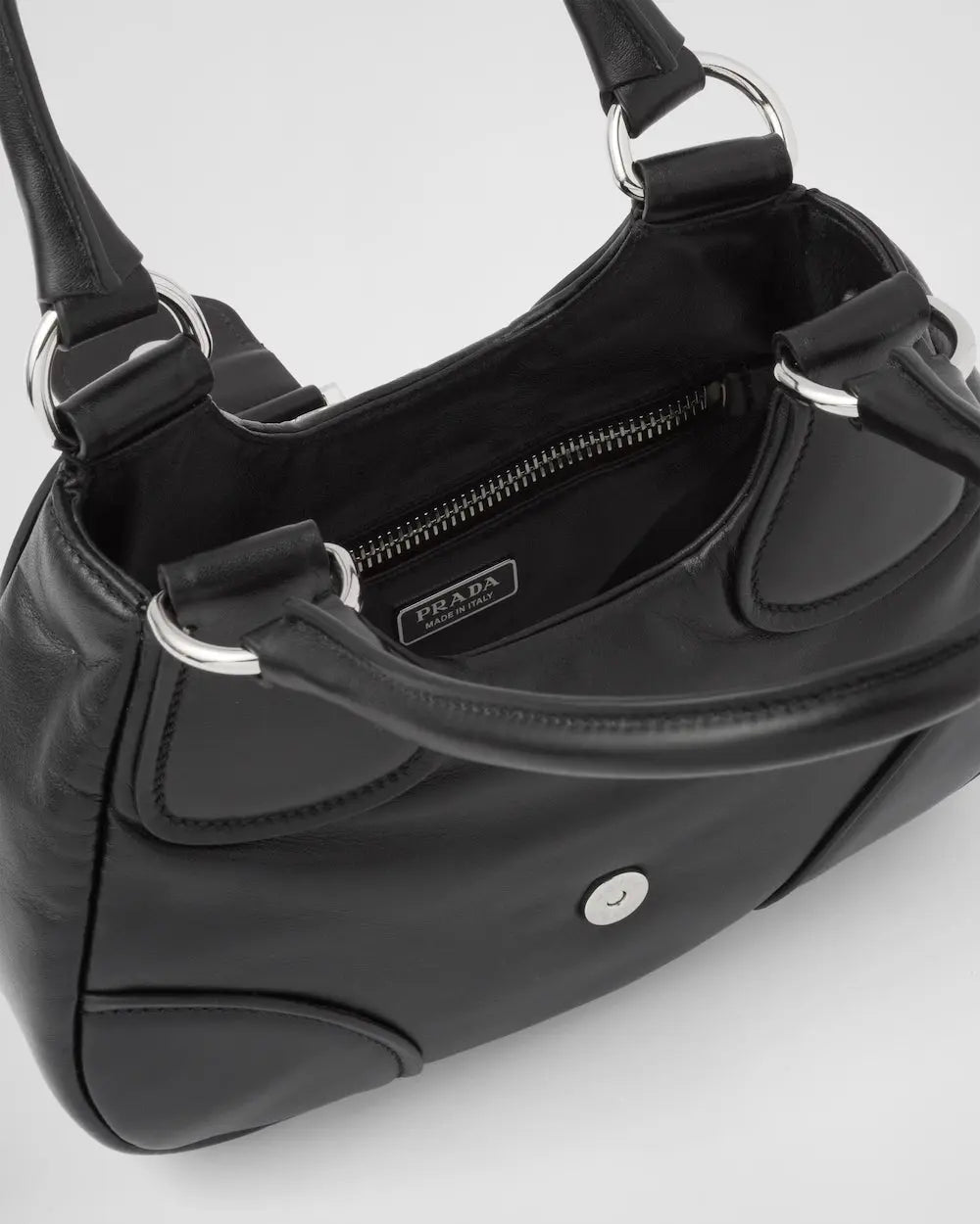 Moon Re-Nylon and leather bag – the observation of apparently distant areas leads to innovative combinations and a – LUX VERSE Luxury Designer Fashion Outlet