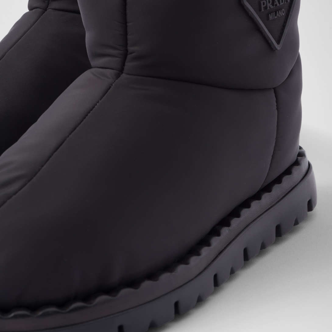 Re-Nylon booties – embossed rubber triangle logo 10 cm boot leg 20 mm rubber sole Lug tread Leather – LUX VERSE Luxury Designer Fashion Outlet