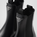 Monolith brushed leather booties – a hybrid yet harmonious soul characterizes the Monolith line that combines – LUX VERSE Luxury Designer Fashion Outlet