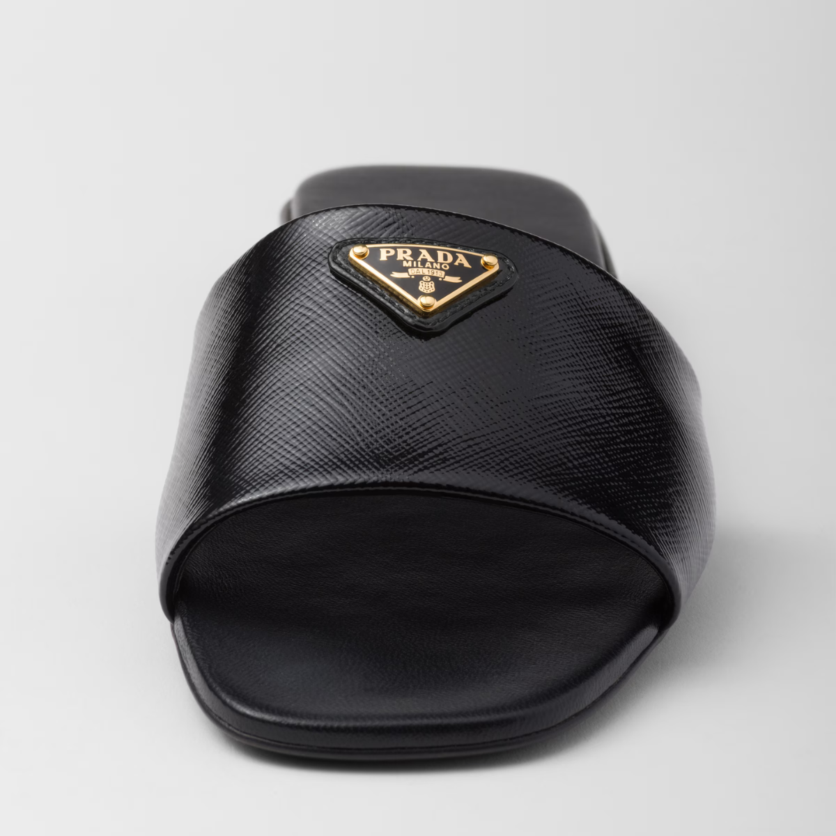 Saffiano patent leather slides – enameled metal triangle logo Leather sole with hot-stamped logo Leather-covered, – LUX VERSE Luxury Designer Fashion Outlet