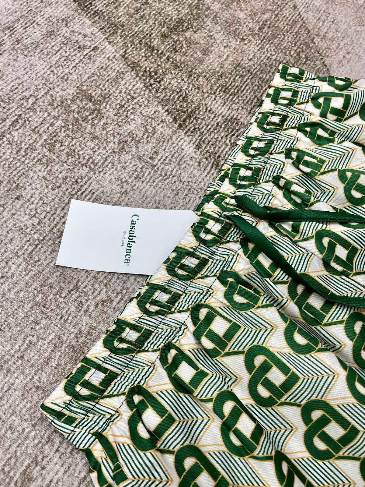 Grüne Seidenshorts mit Monogramm – Herren