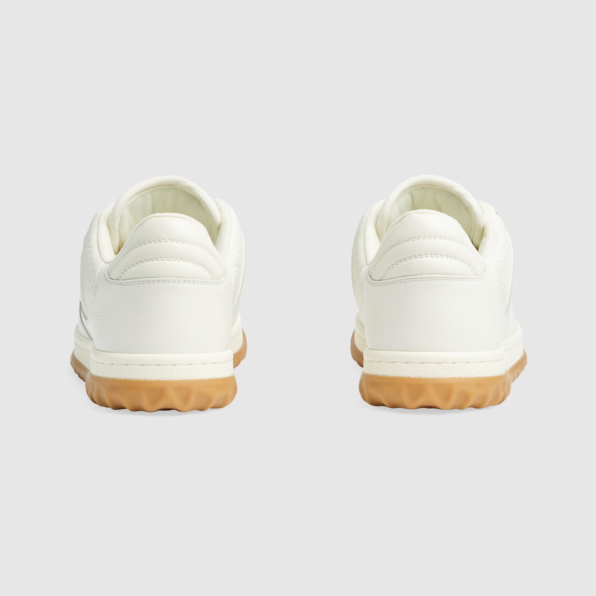 MAC80 sneaker – presented against leather, the motif brings the House logo to the fore – LUX VERSE Luxury Designer Fashion Outlet