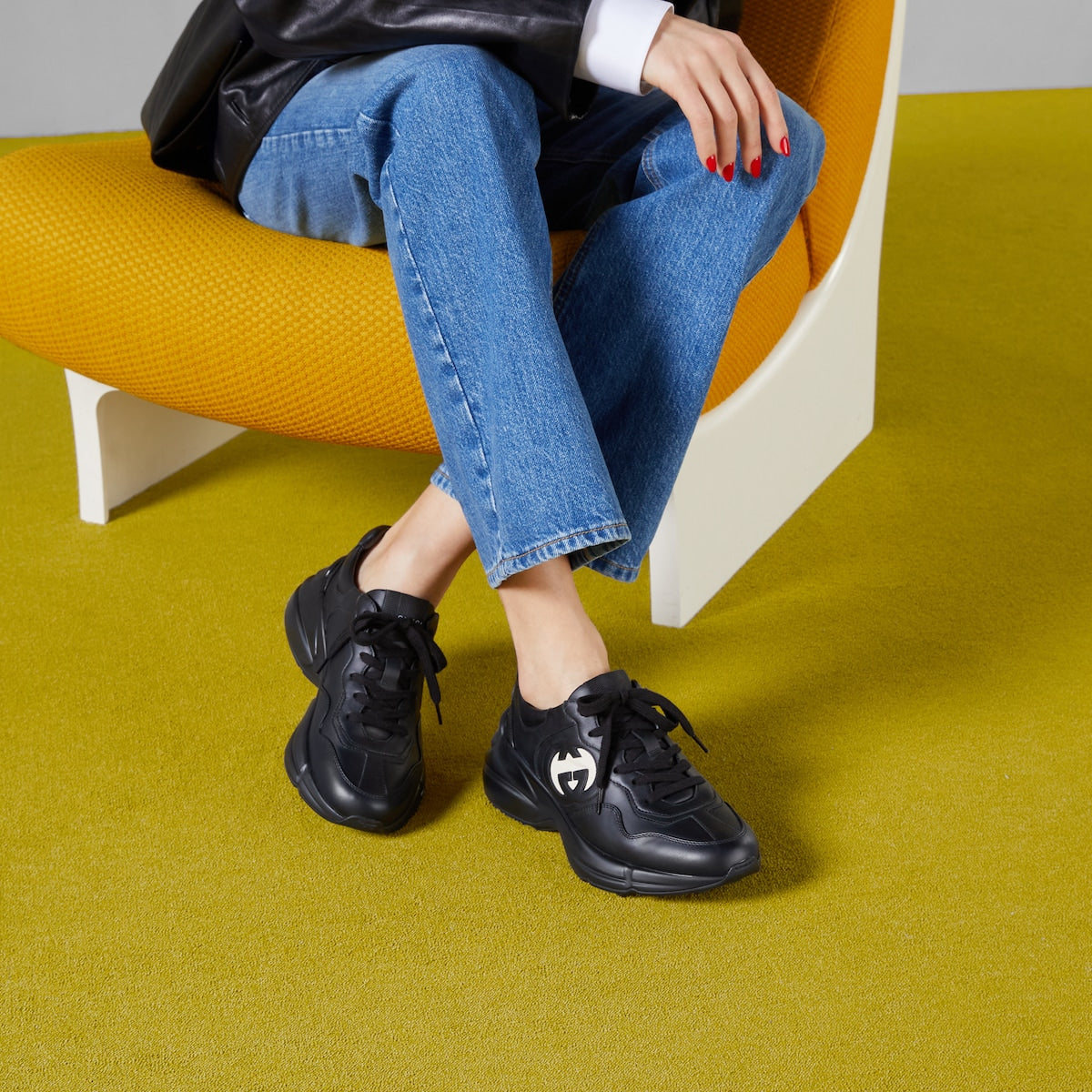 Women's leather Rhyton sneaker – this pair of black leather Rhyton sneakers is defined by a bold Interlocking G – LUX VERSE Luxury Designer Fashion Outlet
