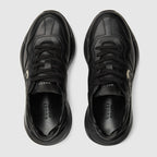 Women's leather Rhyton sneaker – this pair of black leather Rhyton sneakers is defined by a bold Interlocking G – LUX VERSE Luxury Designer Fashion Outlet