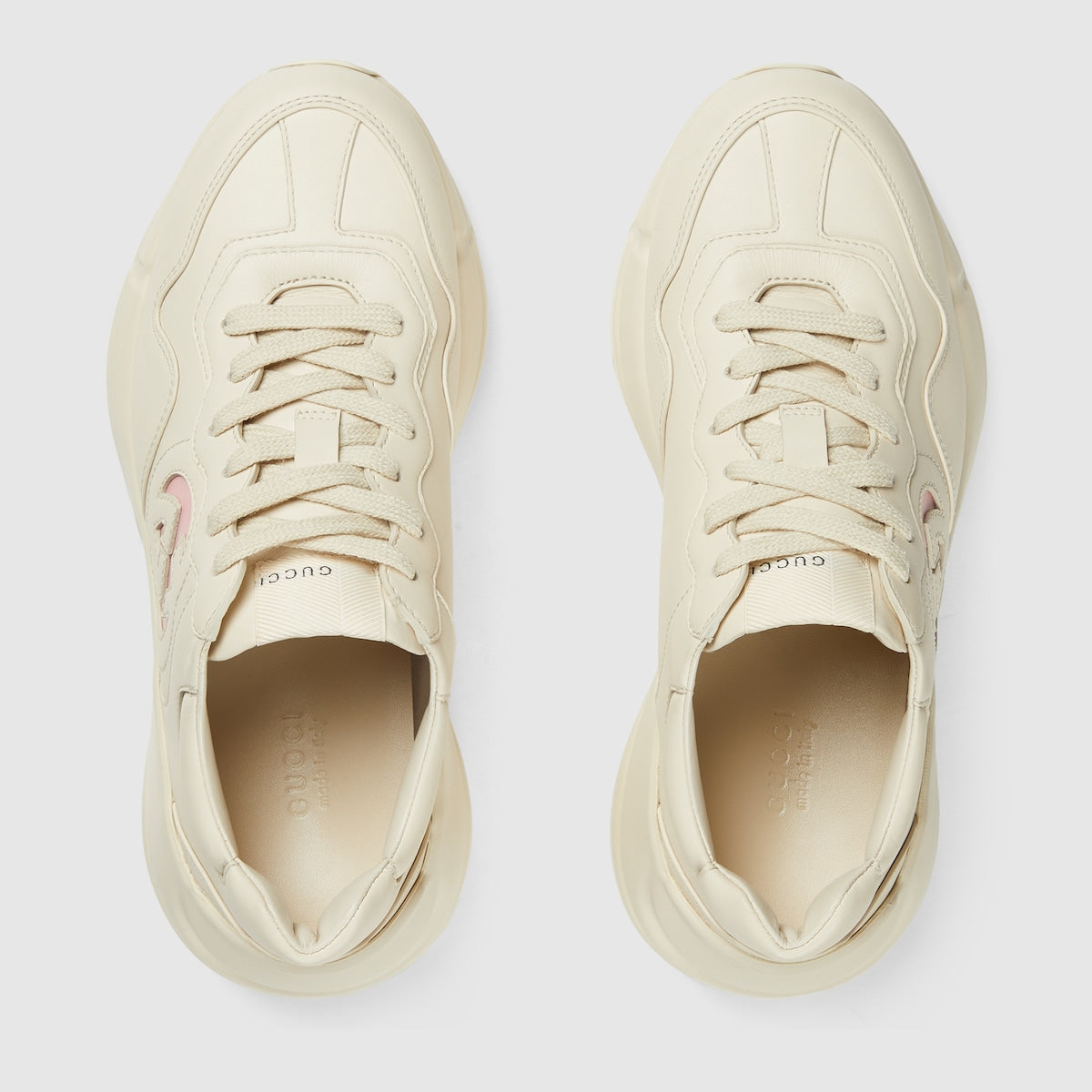 Rhyton sneaker – this pair of ivory leather Rhyton sneakers is defined by a bold Interlocking G – LUX VERSE Luxury Designer Fashion Outlet