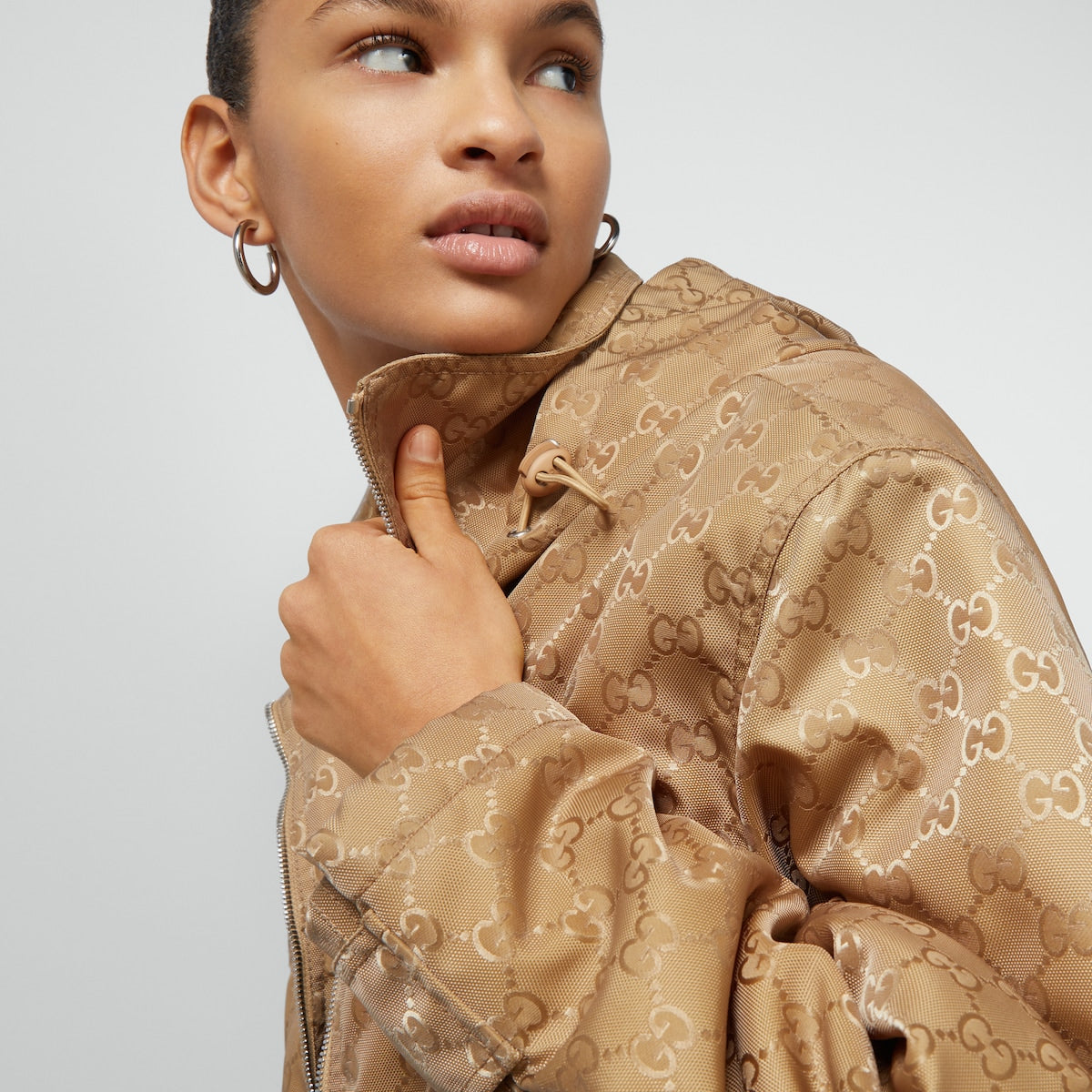 GG nylon canvas padded jacket – presented in GG nylon canvas, this padded jacket is completed with a drawstring hood – LUX VERSE Luxury Designer Fashion Outlet