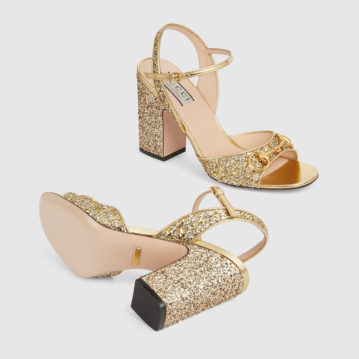 Women's mid-heel sandal with Horsebit – presented in an eye-catching metallic gold leather, this pair of sandals is – LUX VERSE Luxury Designer Fashion Outlet