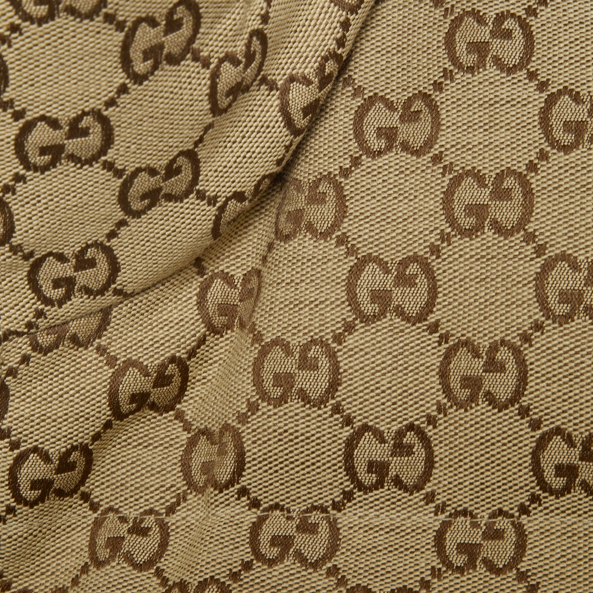 GG canvas padded vest – here, the House's striking monogram is presented across a neutral canvas – LUX VERSE Luxury Designer Fashion Outlet