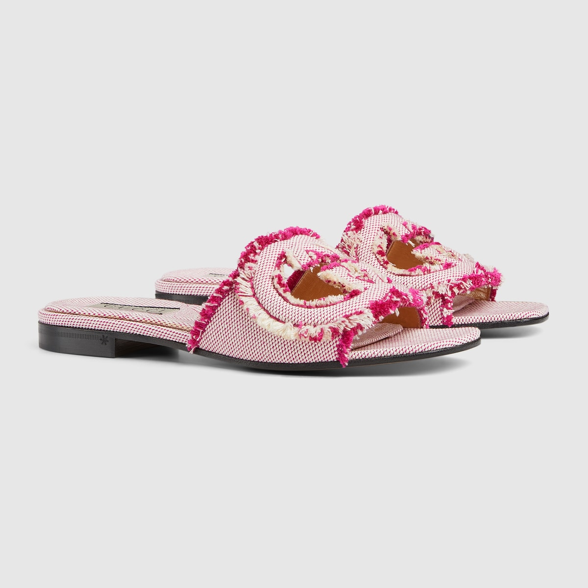 Interlocking slide sandal – taking inspiration from archival codes from the 1970s, hallmark era of the House, – LUX VERSE Luxury Designer Fashion Outlet