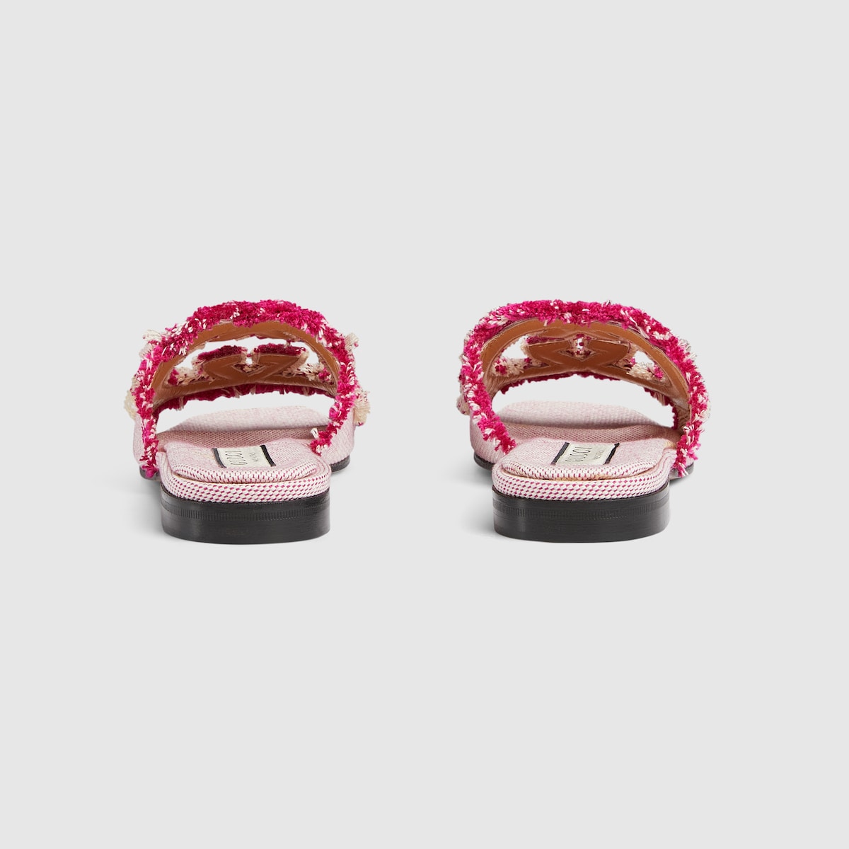Interlocking slide sandal – taking inspiration from archival codes from the 1970s, hallmark era of the House, – LUX VERSE Luxury Designer Fashion Outlet