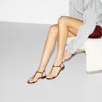 Signoria thong sandal – with its shiny patent leather, leather sole and eye-catching chain, this sandal – LUX VERSE Luxury Designer Fashion Outlet