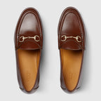Horsebit platform loafer – crafted from dark brown leather, the shoe is complete with a light gold-toned – LUX VERSE Luxury Designer Fashion Outlet