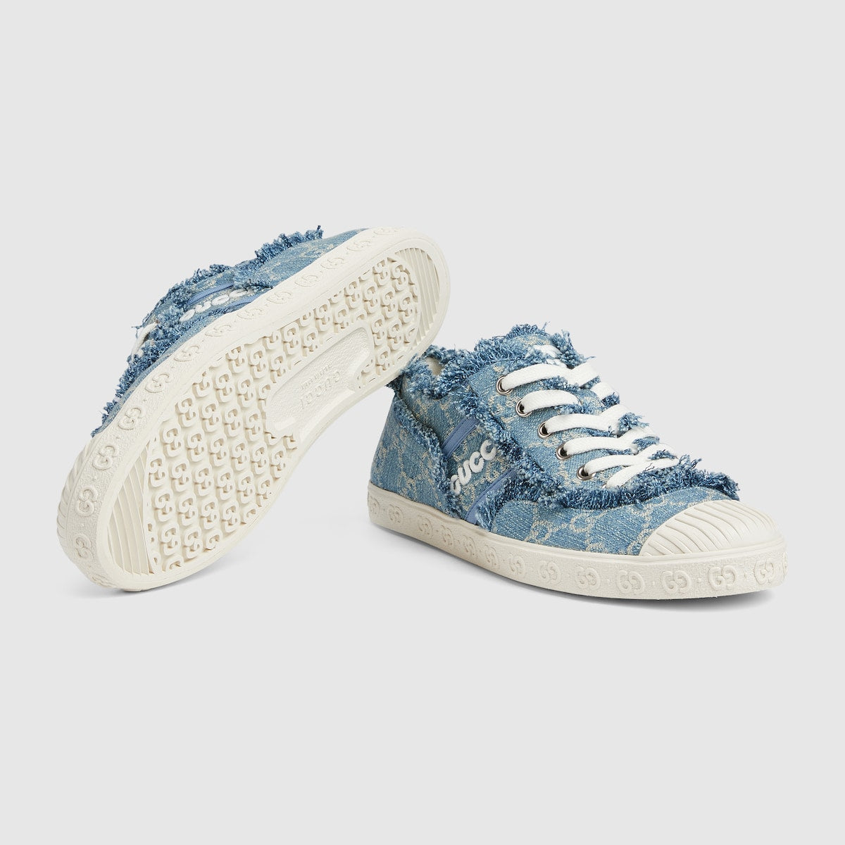 Women's GG denim sneaker – appearing in light blue, this pair of women's lace-up sneakers is defined by – LUX VERSE Luxury Designer Fashion Outlet