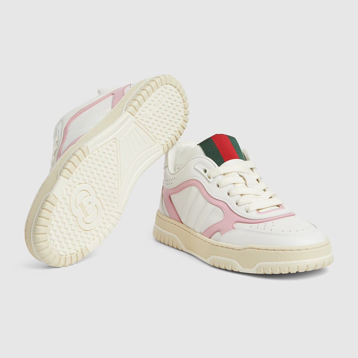 Women's Re-Web Leather Sneaker – this pair is crafted from white leather with a pink leather trim detail – LUX VERSE Luxury Designer Fashion Outlet