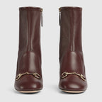 Women's ankle bootie – this pair of boots are crafted in refined stretch leather and defined by the iconic – LUX VERSE Luxury Designer Fashion Outlet
