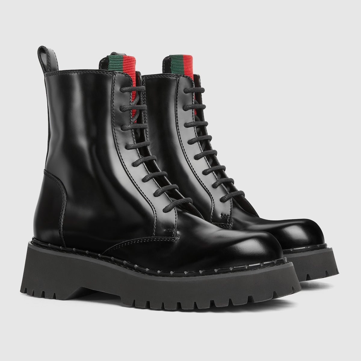 Women's bootie with Web – this boot is crafted in shiny leather and defined by a rubber lug sole – LUX VERSE Luxury Designer Fashion Outlet