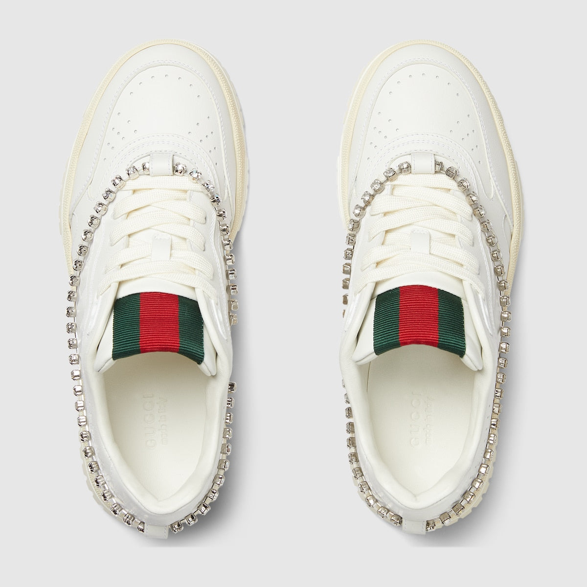 Women Iconic sneaker – this pair is crafted from white leather and enriched by a crystal chain detail – LUX VERSE Luxury Designer Fashion Outlet